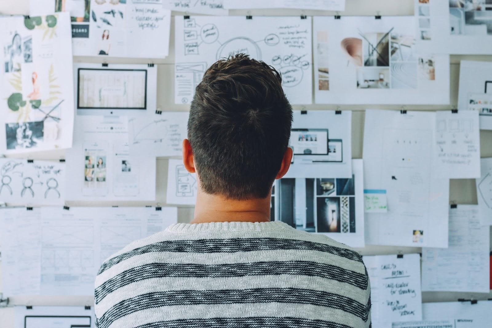 Person staring at planning board