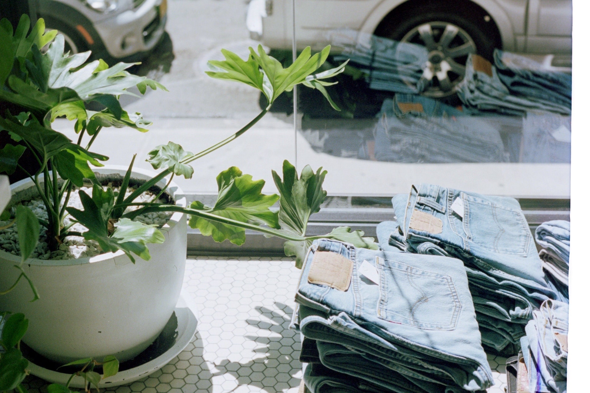 Pile of jeans folded in shop window